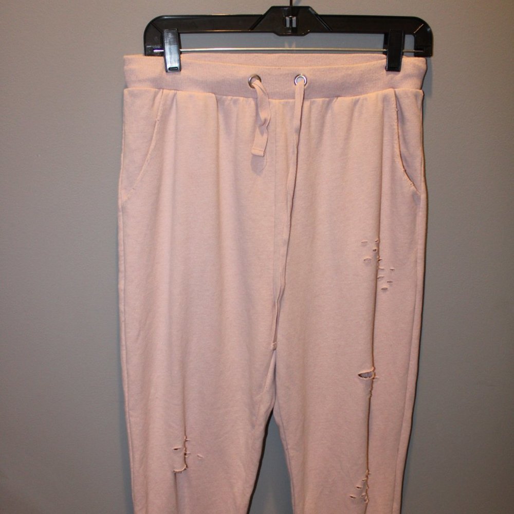 Distressed pink jogger sweats